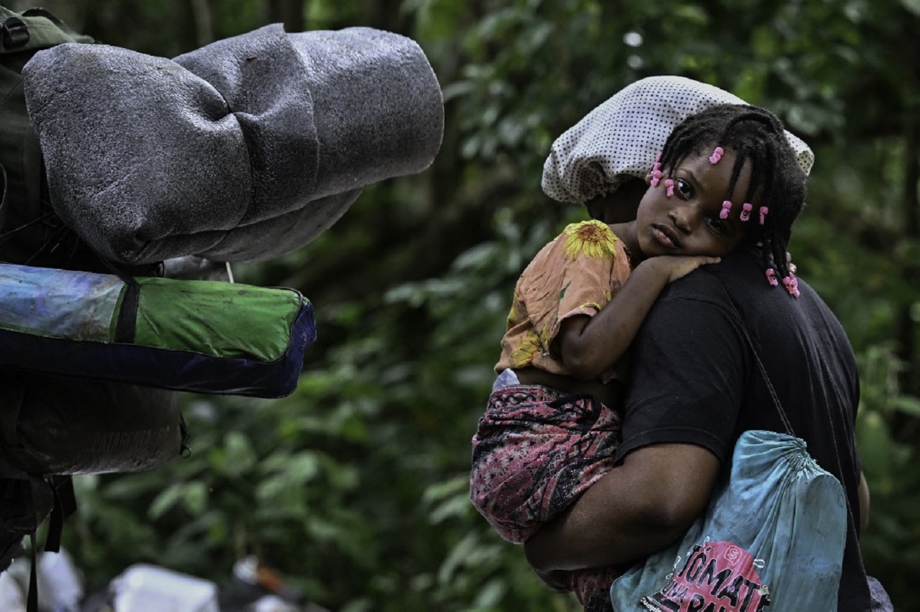 Migrantes atravesando el 'Tapón del Darién'.