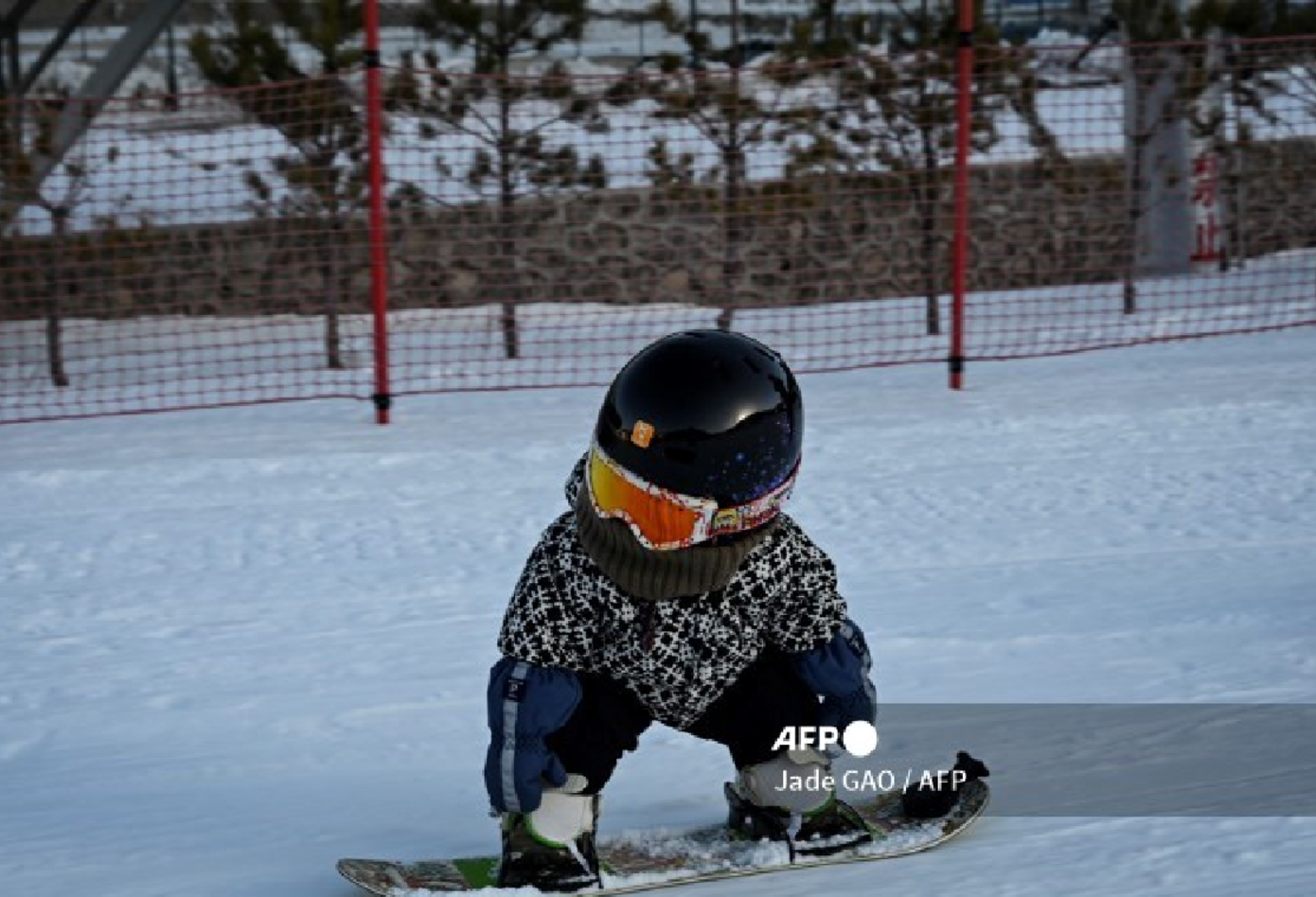 Wang Yuji en snowborad