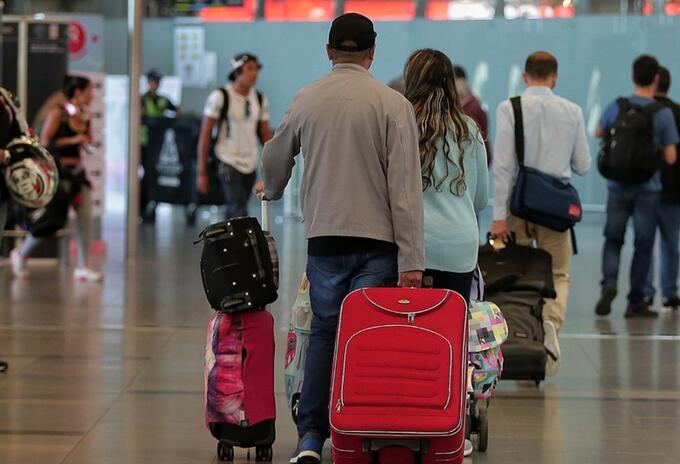 Pasajeros en aeropuerto El Dorado