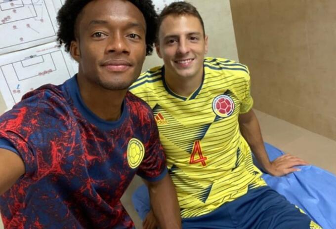 Juan Guillermo Cuadrado y Santiago Arias