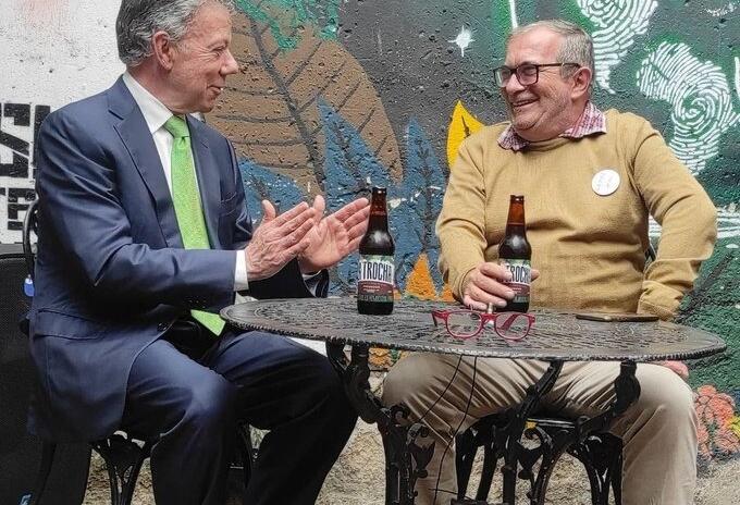 Ex presidente Juan Manuel Santos y Rodrigo Londoño