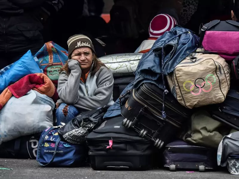 Venezolanos migración maletas