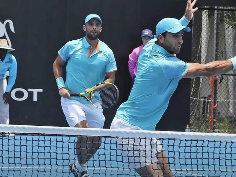 Cabal y Farah durante un partido Cabal y Farah durante un partido