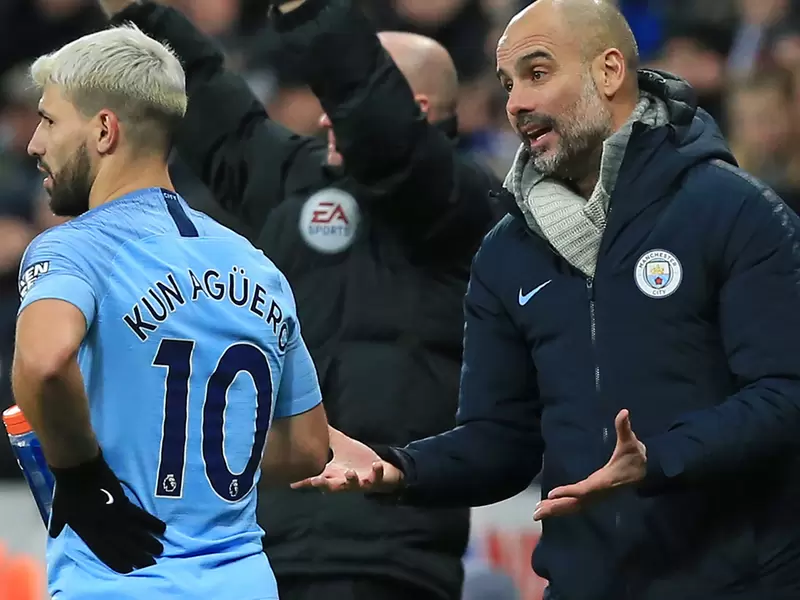 Sergio Agüero y Josep Guardiola