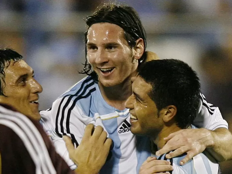 Juan Román Riquelme y Lionel Messi Juan Román Riquelme y Lionel Messi