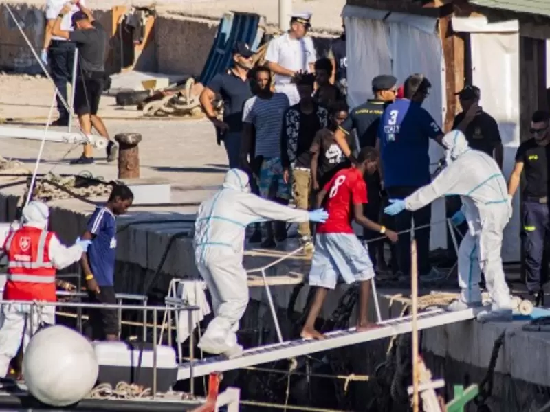 barco migrantes
