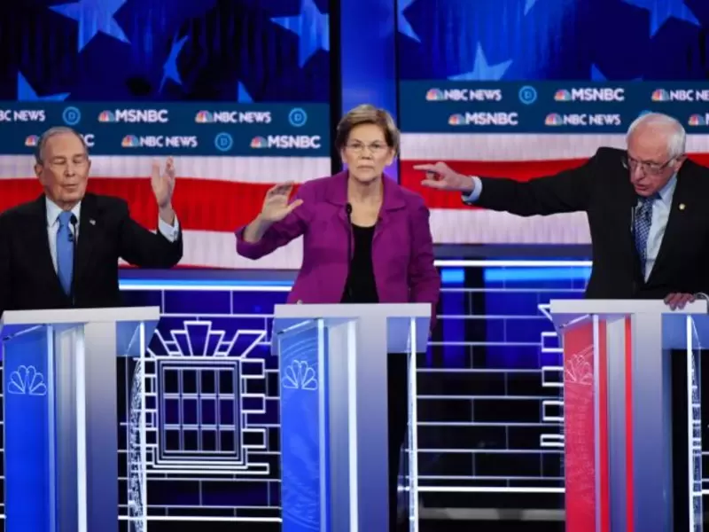 Michael Bloomberg, Elizabeth Warren y Bernie Sanders