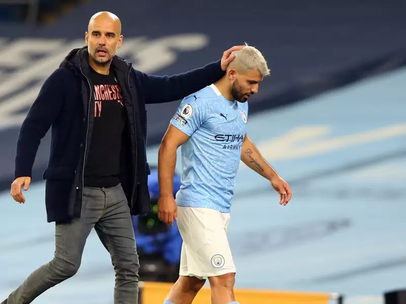 Pep Guardiola y Sergio Agüero Pep Guardiola y Sergio Agüero