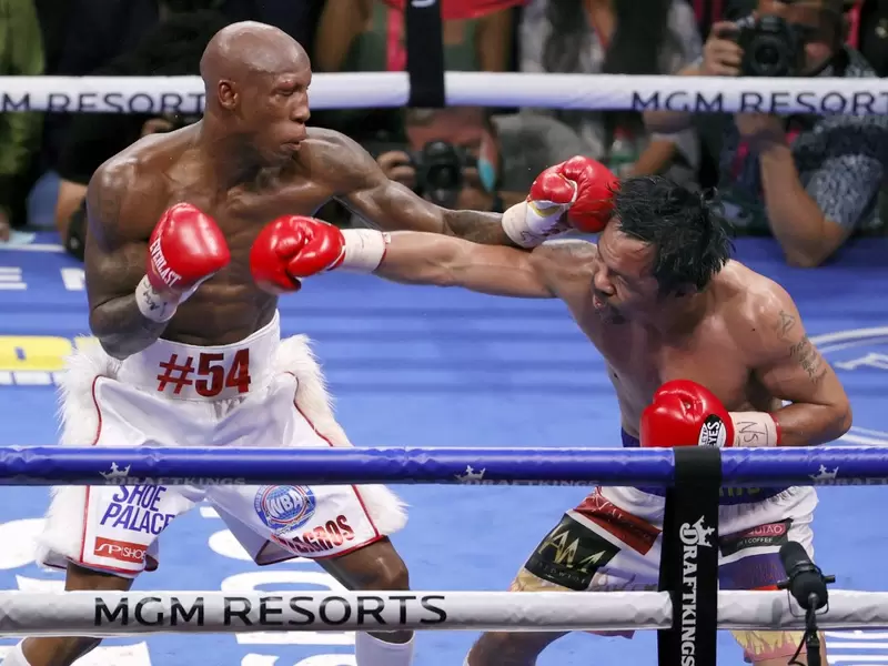Cubano Ugás retiene su título welter venciendo a Manny Pacquiao Cubano Ugás retiene su título welter venciendo a Manny Pacquiao