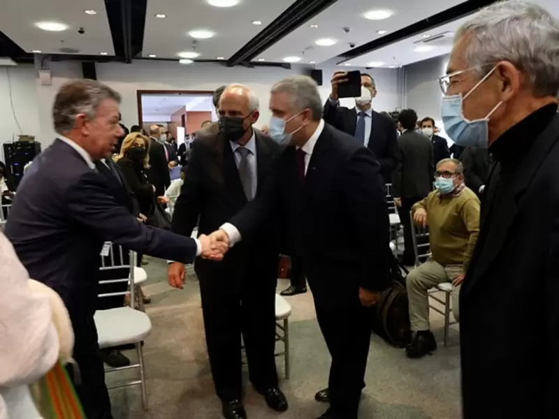 JUAN MANUEL SANTOS E IVÁN DUQUE