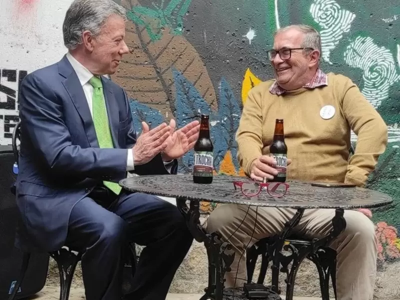 Ex presidente Juan Manuel Santos y Rodrigo Londoño