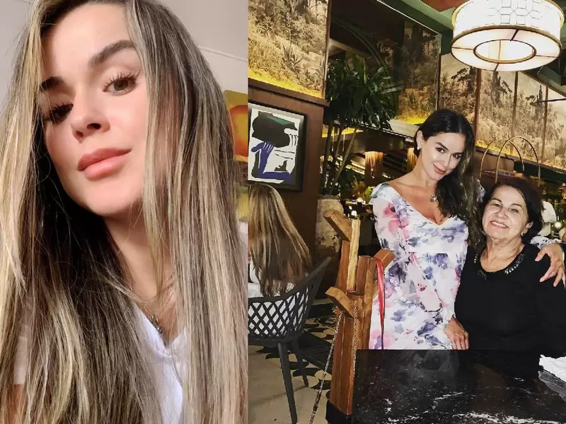Una mujer abraza a otra en restaurante lujoso