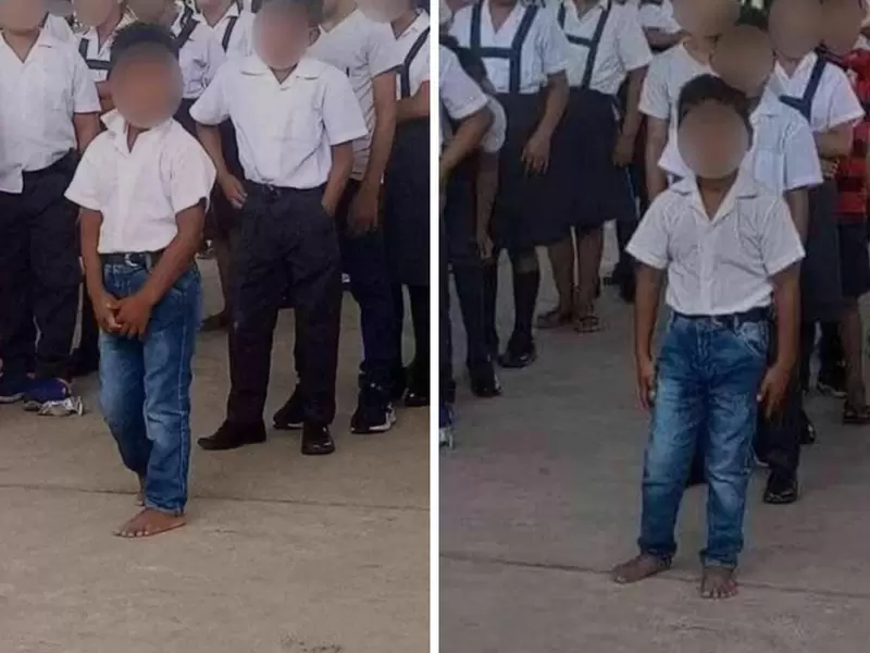 Niño va al colegio descalzo Niño va al colegio descalzo