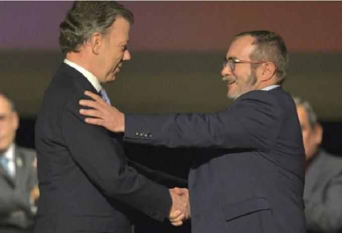 Presidente Juan Manuel Santos y 'Timochenko' Presidente Juan Manuel Santos y 'Timochenko'